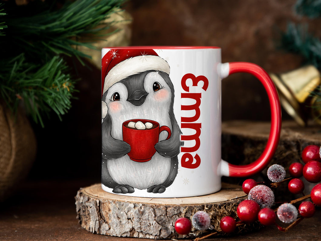 White Ceramic mug with a festive red rim and handle printed with a cheerful little Penguin holding a mug of steaming hot chocolate and Marshmallows peeking back at you. His festive red Christmas hat perched cheekily on his head. Personalised with any name and printed on both sides. Also available in plain white