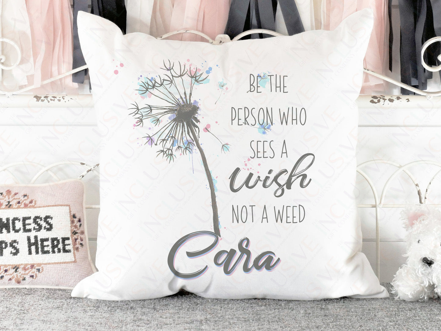Plush white Cushion with vibrant printed Dandelion in its seeded state and sentimental wording Be The Person who sees a wish not a weed and matching name
