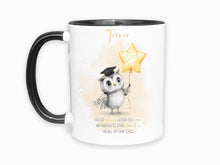 Load image into Gallery viewer, A white mug with black rim and handle. An adorable owl with a teacher cap holding a gold balloon design and Grey and gold verse is printed directly on the mug so will not fade. Available with or without personalisation.
Verse reads 
Name. 
Oh so clever, ever so wise 
an absolute star teacher
in all of our eyes.
