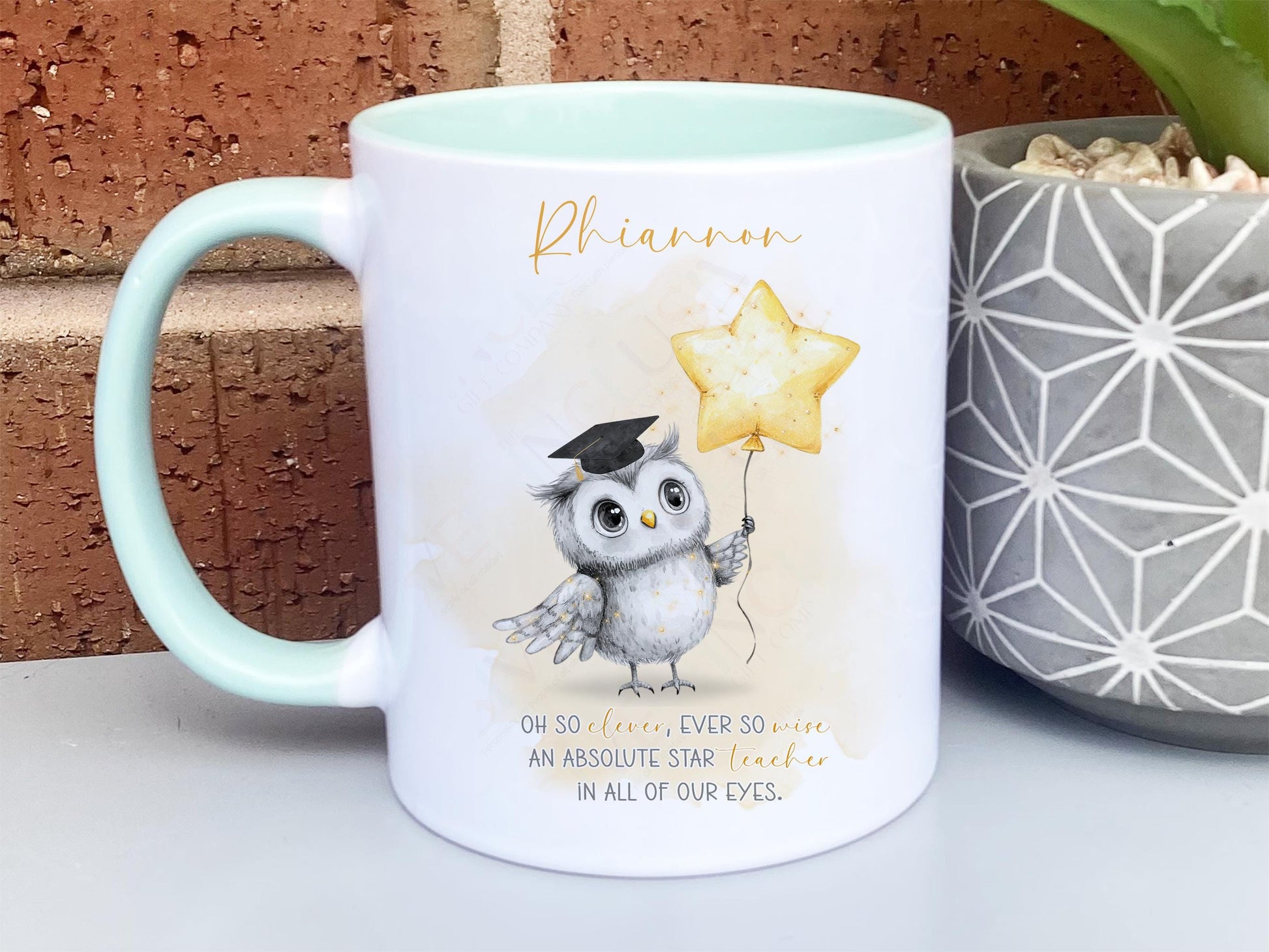 A white mug with mint rim and handle. An adorable owl with a teacher cap holding a gold balloon design and Grey and gold verse is printed directly on the mug so will not fade. Available with or without personalisation.
Verse reads 
Name. 
Oh so clever, ever so wise 
an absolute star teacher
in all of our eyes.