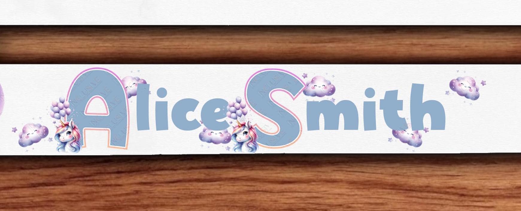 Cute Unicorn heads adorn the first letter of each name.