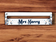 Load image into Gallery viewer, Cute spacemen stand alongside the first letter of each name. Inside the letter is printed with space doodles  of constellations and planets and therest finished in a matching night sky blue. This images show it without the optional ruler print
