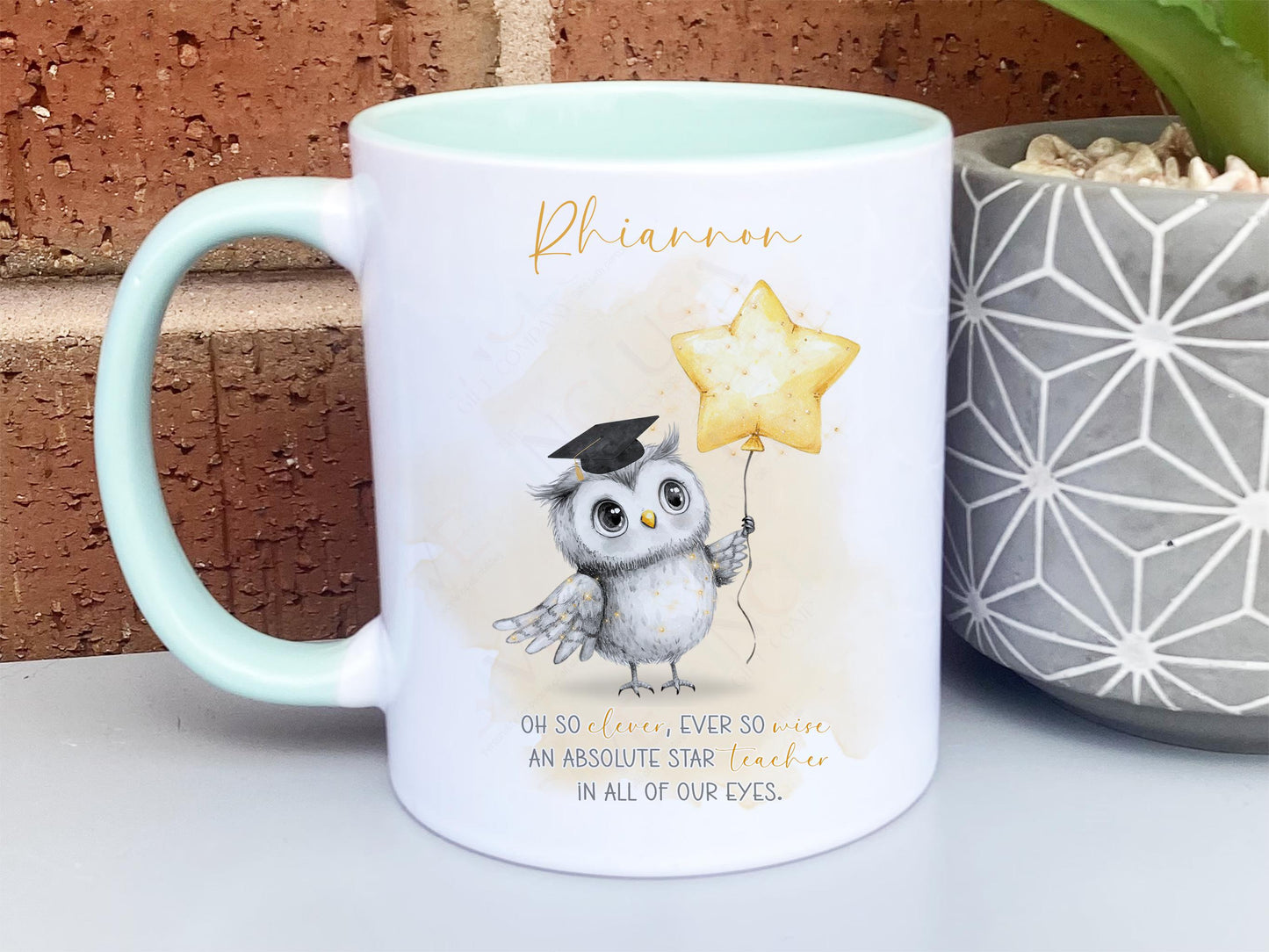 A white mug with mint rim and handle. An adorable owl with a teacher cap holding a gold balloon design and Grey and gold verse is printed directly on the mug so will not fade. Available with or without personalisation.
Verse reads 
Name. 
Oh so clever, ever so wise 
an absolute star teacher
in all of our eyes.