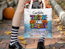 Load image into Gallery viewer, White canvas tote bag, Printed with a Spooky Trick or treat design including Ghosts, pumpkins and spiders in Bright colours. If a Name is requested it will be printed in black ink above the design at the top of the bag.
