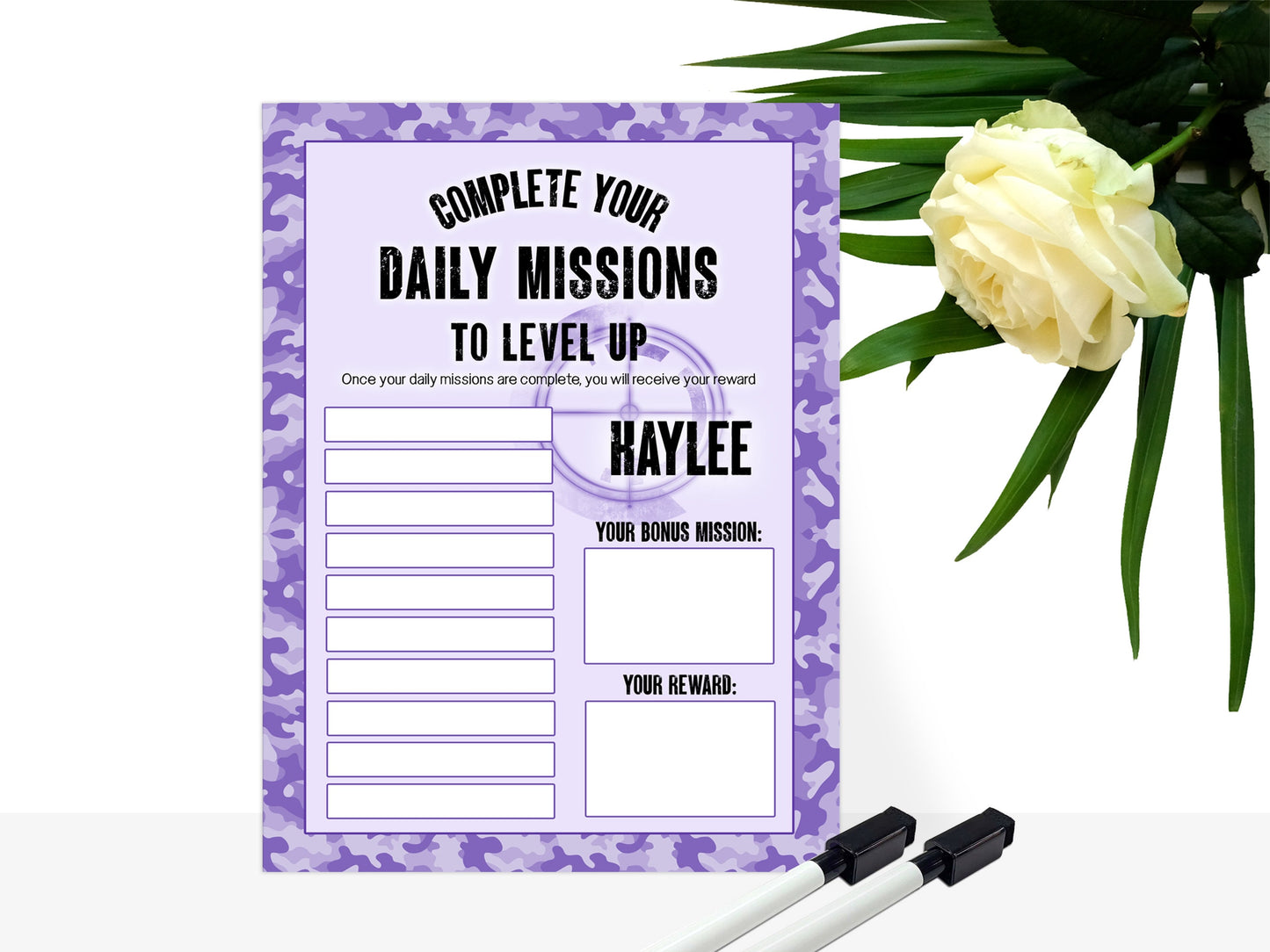 Purple Camo Printed sign with shoot em up gamer style background and blank tasks and reward boxes for you to fill in. 

Text reads - Name Complete your daily missions to level up. Once your daily missions are complete you will receive your reward.