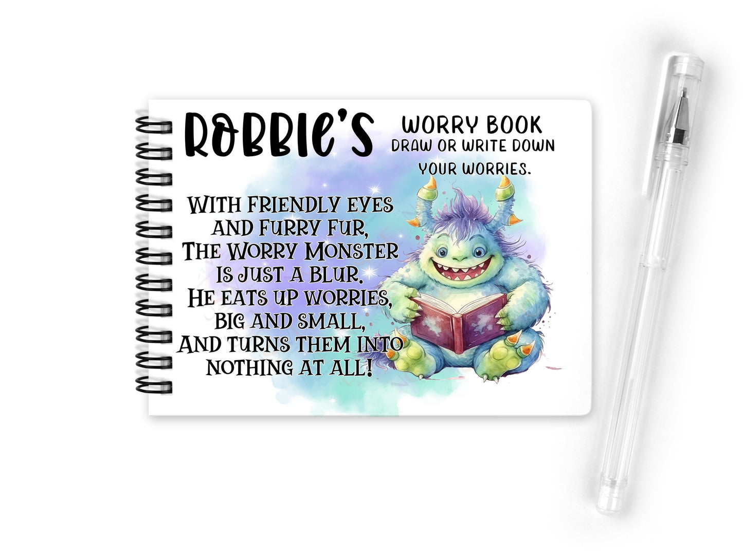 Notebook shows a colourful friendly worry monster reading a book and text With friendly eyes and furry fur, the worry monster is just a blue. He eats up worries big and small and turns them into nothing at all.