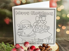 Load image into Gallery viewer, Colour your own White 5x5 inch sq card with black and white line drawing of Santa and Tree. Wordings reads Merry Christmas from Name)
