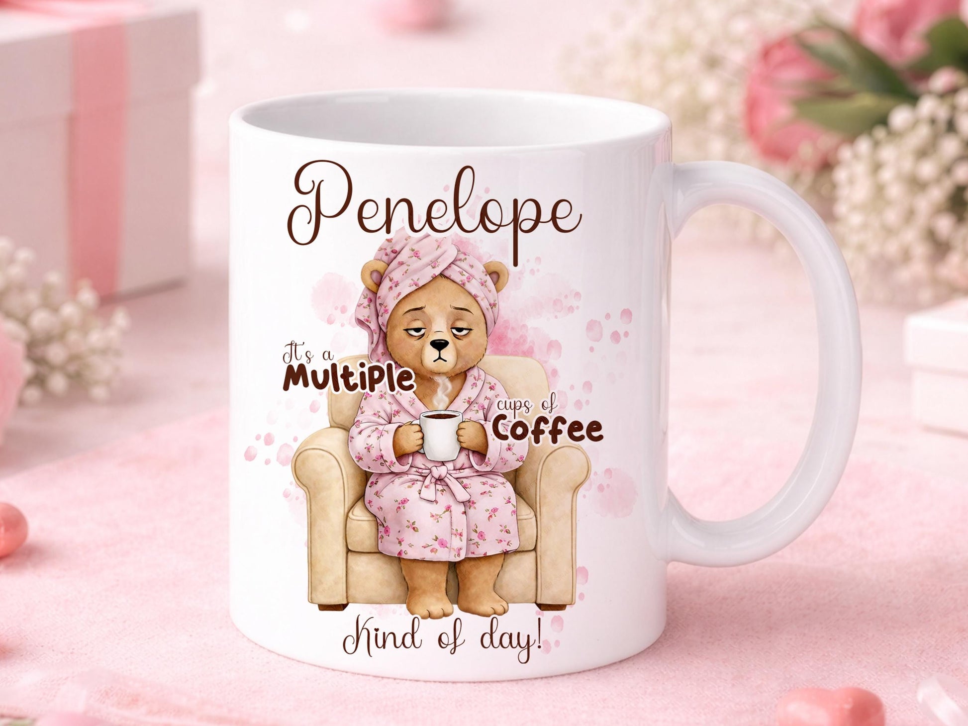 Personalised Coffee lover Mug With Name White coffee mug printed with a gorgeous sleepy bear relaxing in her arm chair with a white & Pink flowery bath robe and Head towel wrap holding a cup of strong coffee. Personalised with any name and the design text reads. Its a multiple cups of Coffee kind of day.