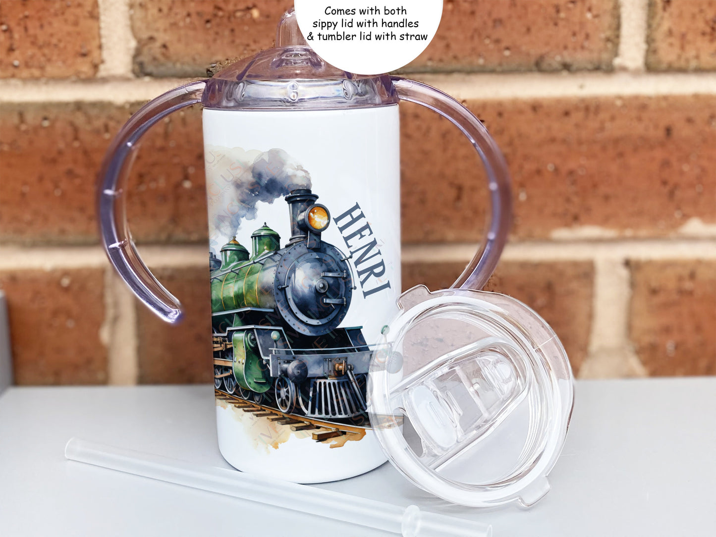 Comes with two lids
Sippy lid with handles spout and removable filter. 
Tumbler lid comes with straw no handles