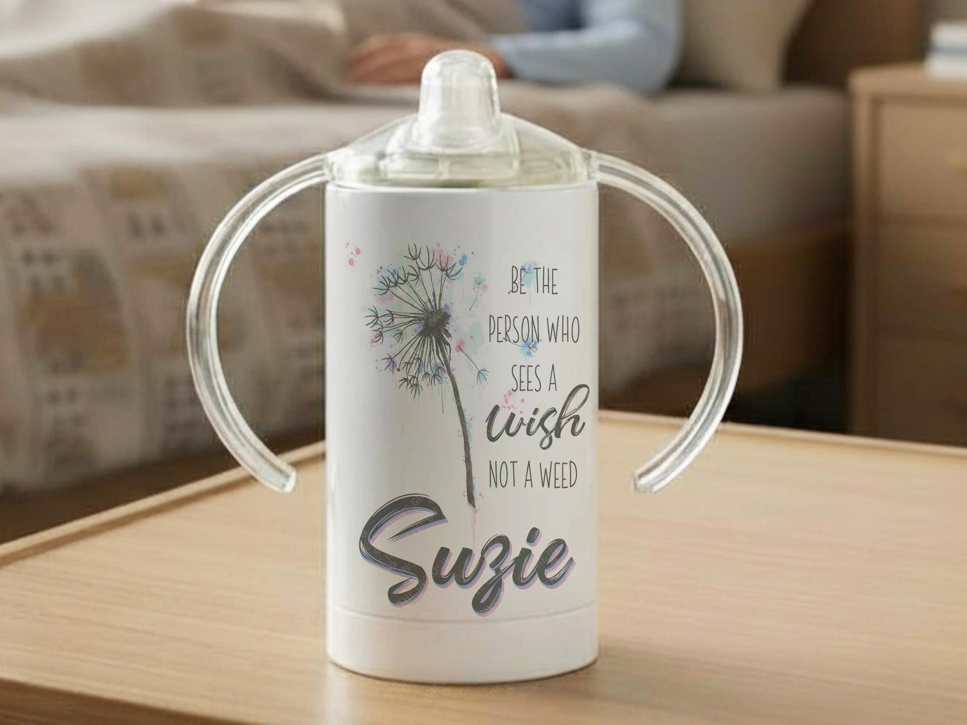 12oz insulated Stainless Sippy cup with spout for adults with disabilities. Printed with a dandelion clock and an uploifting quote that reads 'Be the person who sees a wish not a weed' and any name in a matching Grey, pink and blue.