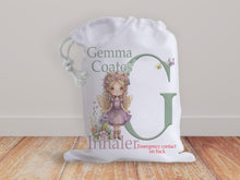 Load image into Gallery viewer, White drawstring bag with a beautiful fairy and initial letter in muted natural colours. Bag shows Initial of first name and a character with text reading name inhaler if you choose to have emergency contact or instructions on back it will state this is available on the front.
