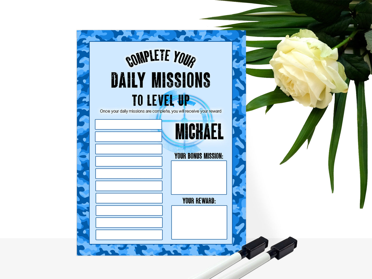 Blue Camo Printed sign, with shoot em up gamer style background and blank tasks and reward boxes for you to fill in. 

Text reads - Name Complete your daily missions to level up. Once your daily missions are complete you will receive your reward.