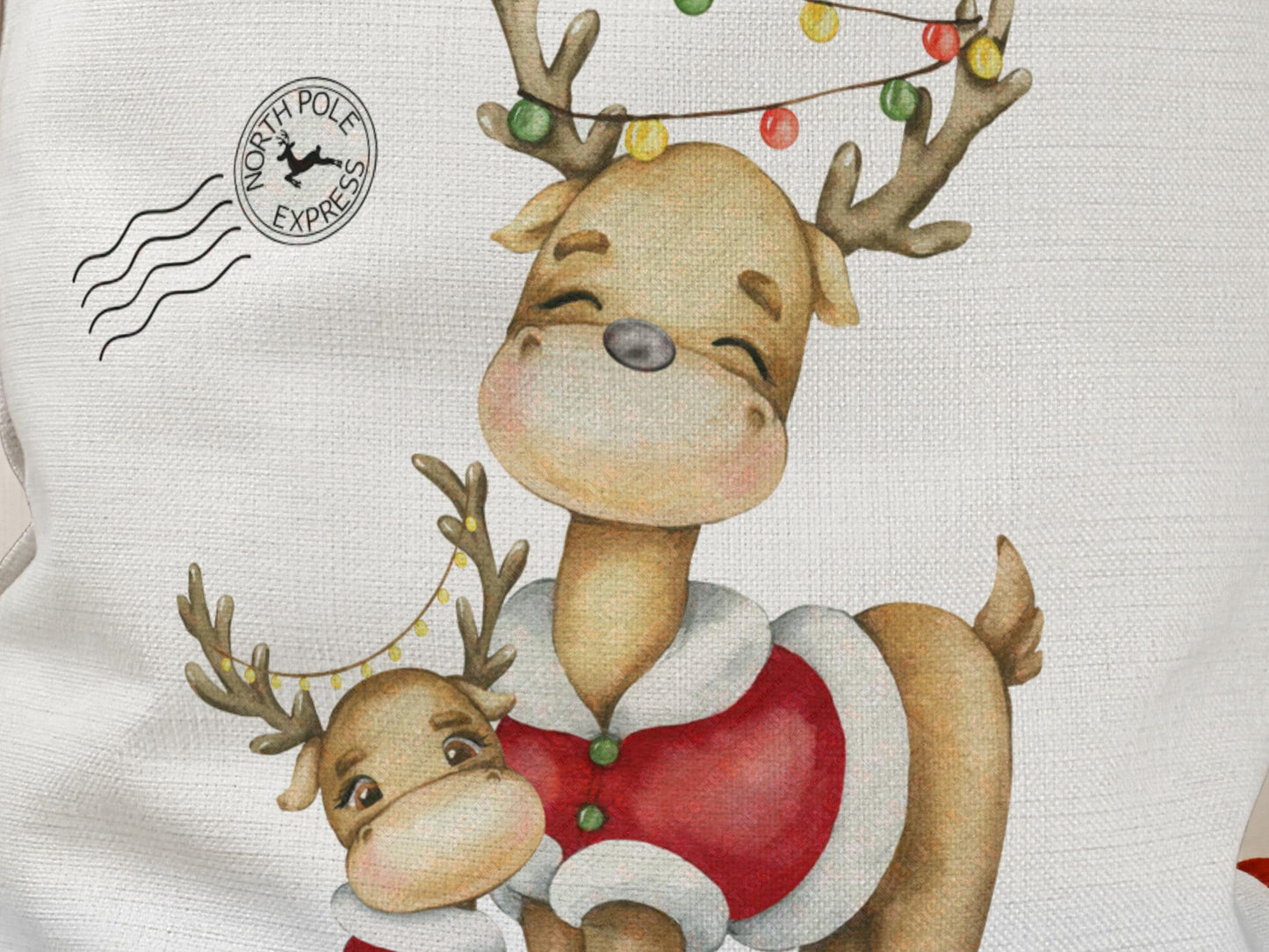 Close-up of the middle part of the design showing two reindeer wearing red Santa outfits. The larger reindeer has colorful Christmas lights wrapped around its antlers, while the smaller reindeer has a string of yellow lights between its antlers. A "North Pole Express" stamp graphic is printed nearby.