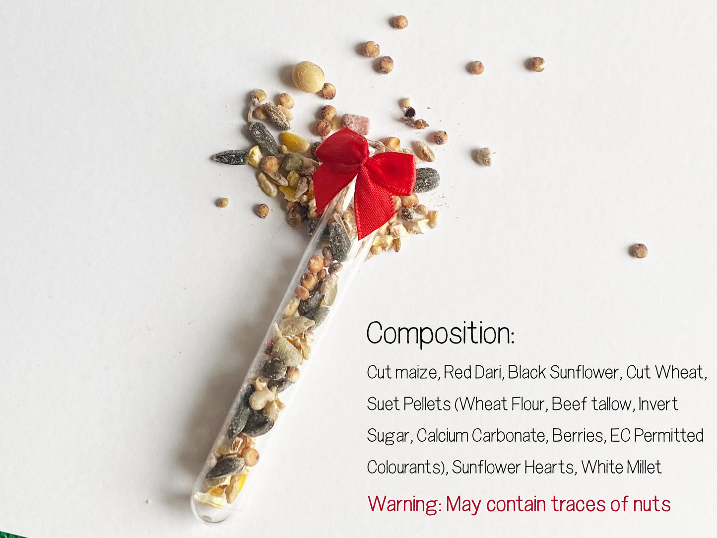 Ingredient composition: Cut Maize, Red Dari, Black Sunflower, Cut Wheat, Suet Pellets ( Wheat Flour, Beef Tallow, Invert Sugra, Calcium Carbonate, Berries, Fruits, EC Permitted Colourants), Sunflower Hearts, White Millet. Warning may contain traces of nuts