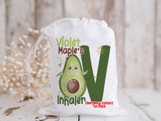 White drawstring bag with Funny Avocado and initial letter in matching Green and brown colours. Bag shows Initial of first name and a character with text reading name inhaler if you choose to have emergency contact on back it will state this is available on the front.