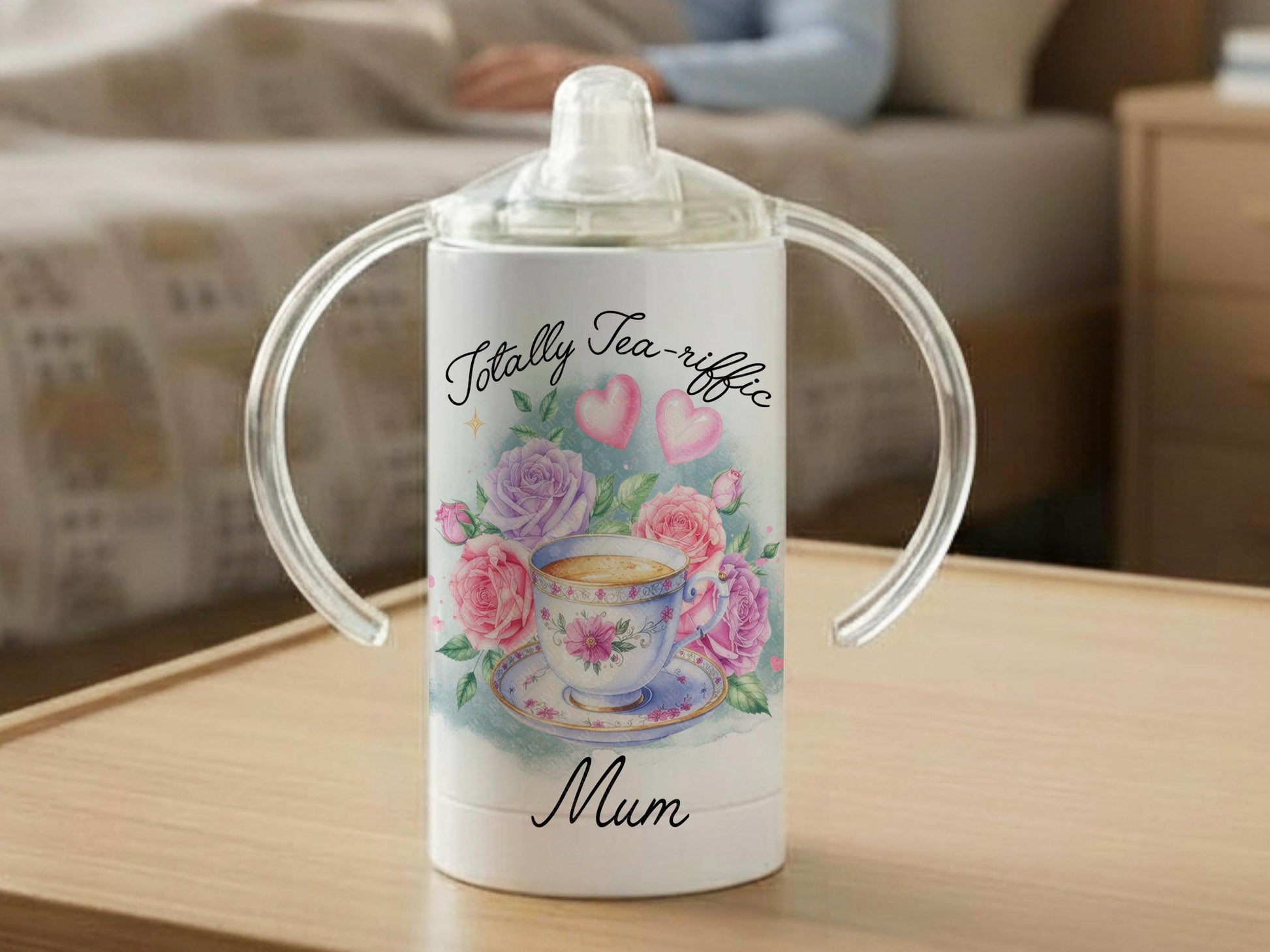 12oz insulated Stainless Sippy cup with spout for adults with disabilities. Printed with a Pink Roses & Teacup design, the text 'Totally Tea-riffic' arches around the top of the design and any name under the design.