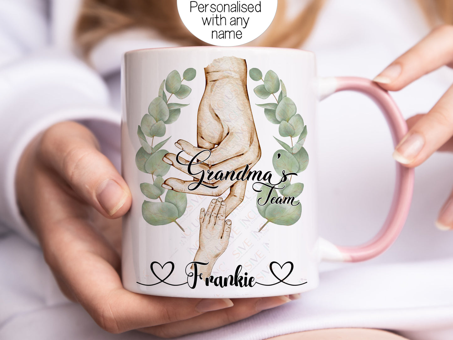 Ceramic mug with pastel pink handle and rim. Available with options for grandmother too