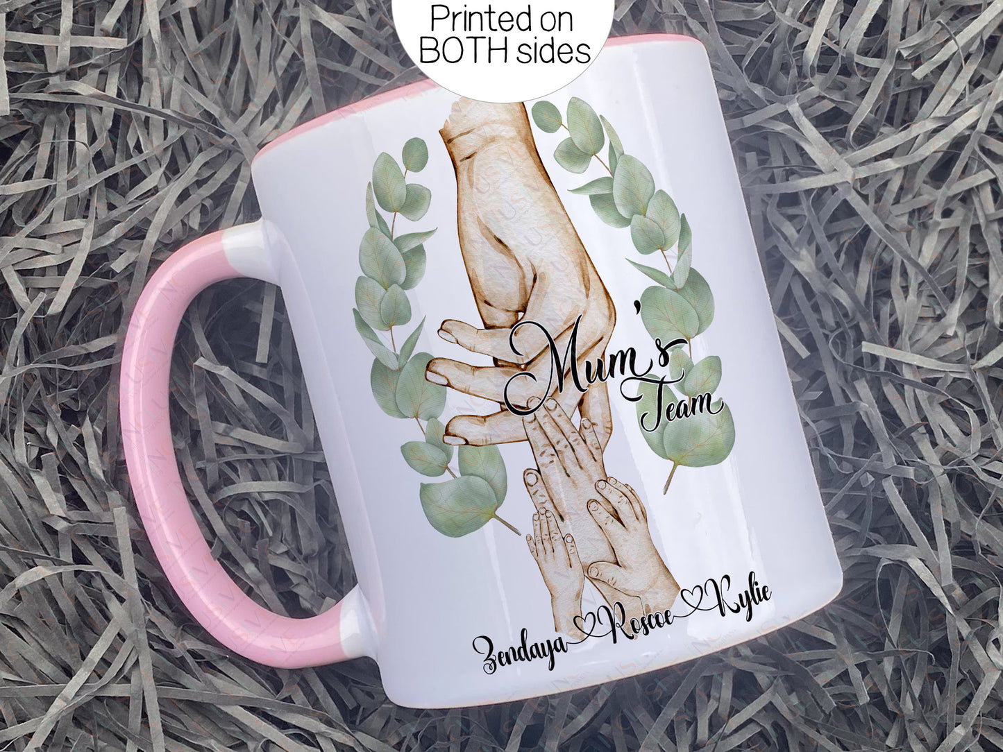 Ceramic mug with pastel pink handle and rim. Printed on both sides