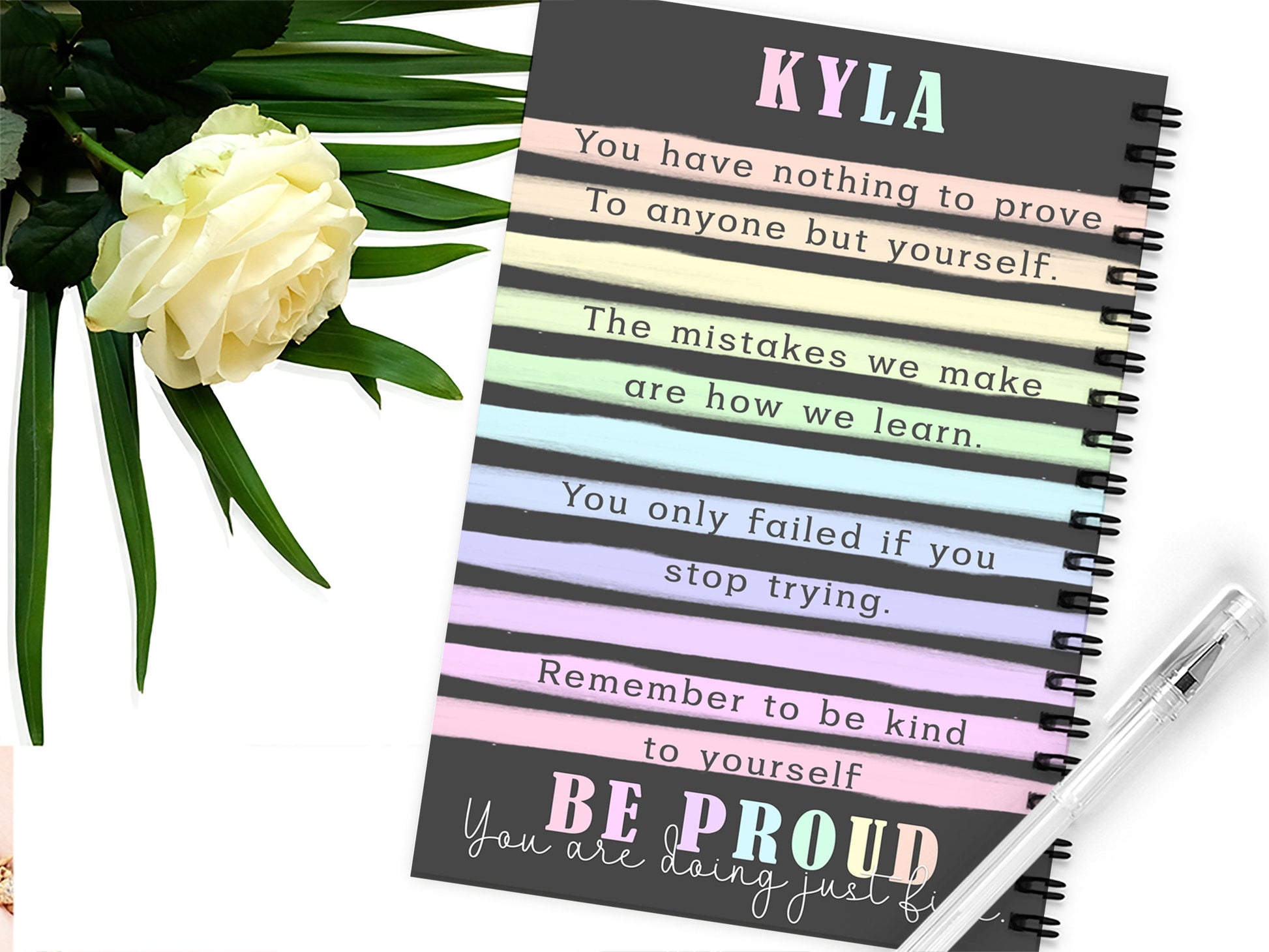 A5 black and pastel rainbow striped notebook with positive affirmations and any name added. back page shown printed same as front
