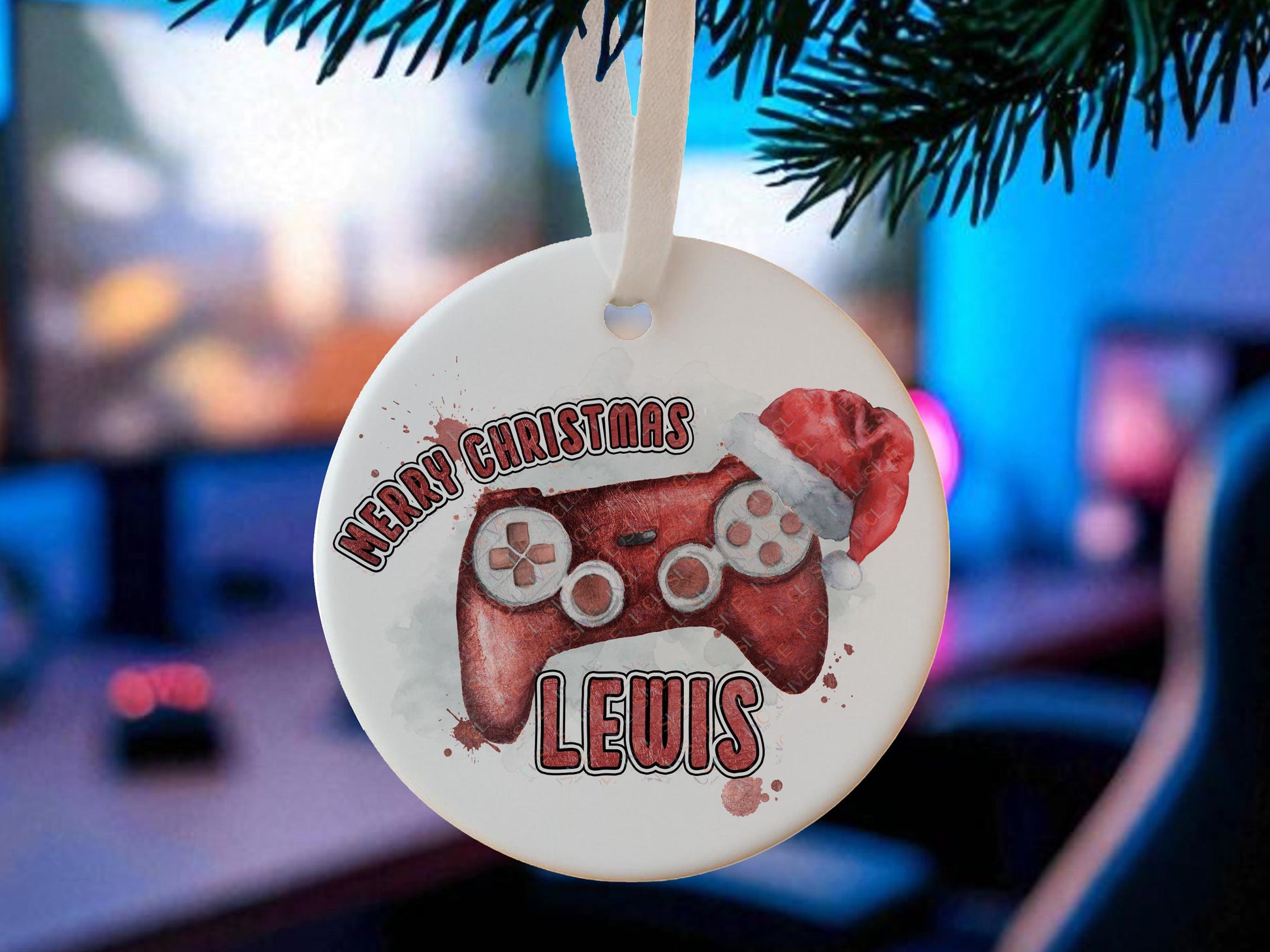 Personalised flat white ceramic Christmas bauble featuring a Christmas gamer themed design -  game console controller in a choice of 6 colours - Red, Blue, Gold, Purple with flowers, Teal with Flowers, Pink with flowers The words Merry Christmas and name or gamertag coloured to match the controller – a perfect stocking stuffer, Gaming room decoration or gift for dad