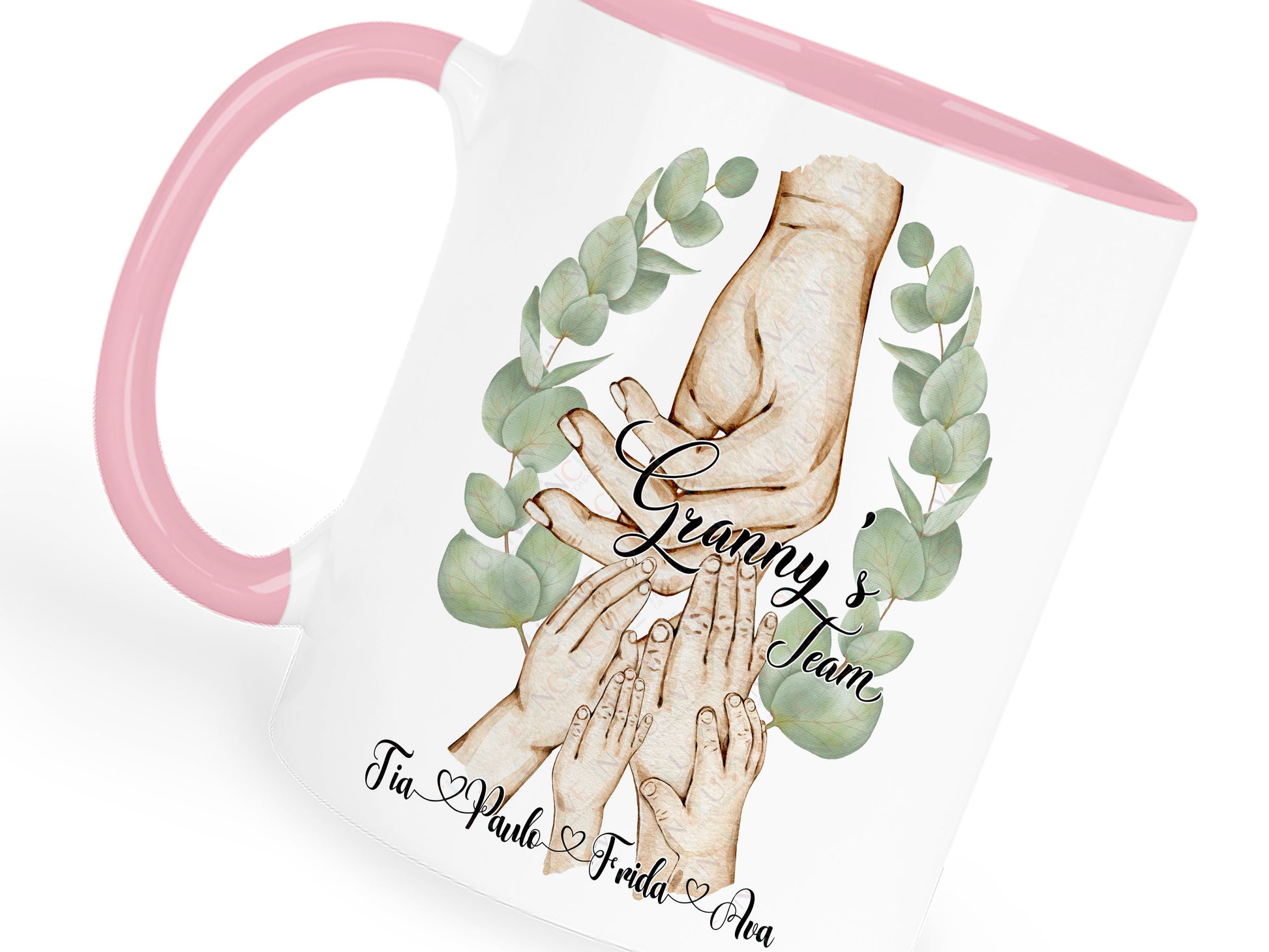 Ceramic mug with pastel pink handle and rim. Printed with watercolour style artwork of adult female hand and 4 childrens hands