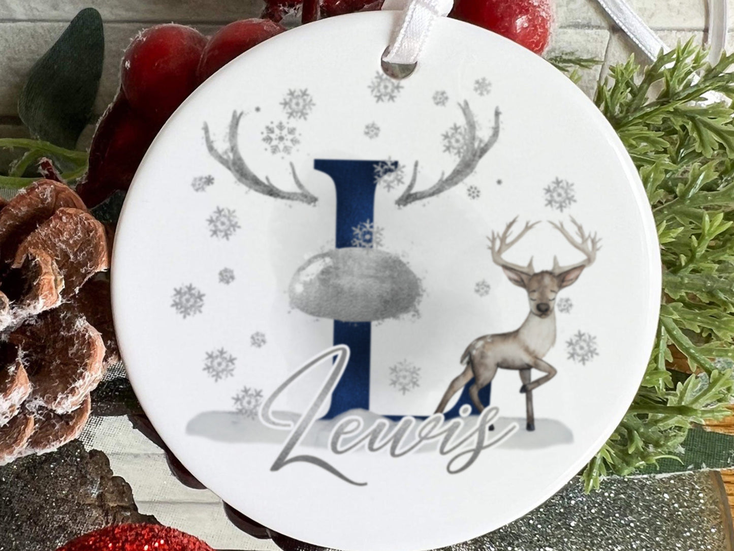 Printed ceramic so will not fade or peel. 

Image shows Navy initial with Silver nose and matching Silver name.